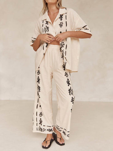 Sonicelife-Black Printed Cream Wide Leg Pants