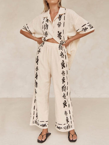 Sonicelife-Black Printed Cream Wide Leg Pants