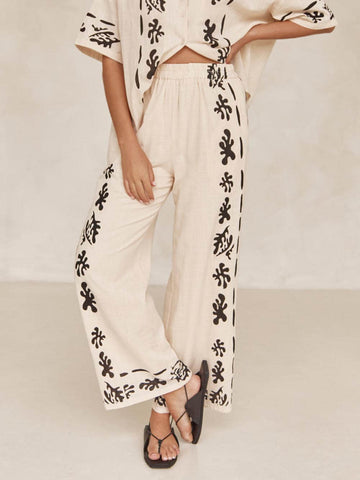 Sonicelife-Black Printed Cream Wide Leg Pants